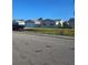 Street view of the home with a garage, front yard, and neighborhood at 6241 Westport Dr, Port Richey, FL 34668