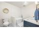 Bright bathroom featuring a modern soaking tub, patterned tile floors, and a new vanity at 7417 Seagull Way, Tampa, FL 33635