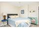 Cozy bedroom with a comfy bed, colorful decor, and a charming coastal vibe, perfect for relaxation at 7417 Seagull Way, Tampa, FL 33635