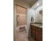 Bright bathroom with a shower/tub combo, vanity with granite countertop, and tiled floors at 7828 Hardwick # 923, New Port Richey, FL 34655