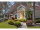 Attractive clubhouse with lush landscaping, sidewalk and guest parking at 7828 Hardwick # 923, New Port Richey, FL 34655