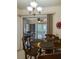 Dining area adjacent to the kitchen features sliding glass doors that provide views of the outdoors at 7828 Hardwick # 923, New Port Richey, FL 34655