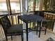 Enjoy outdoor dining on this screened lanai with seating for two at 7828 Hardwick # 923, New Port Richey, FL 34655