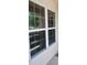Bright white-framed windows offer an exterior view and natural light at 7828 Hardwick # 923, New Port Richey, FL 34655