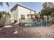 Beautiful backyard featuring a sparkling swimming pool with safety fence and brick paver patio at 11102 Avery Oaks Dr, Tampa, FL 33625