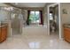Primary bathroom featuring a shower and soaking tub by the window at 11102 Avery Oaks Dr, Tampa, FL 33625
