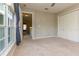 Bedroom featuring neutral walls, plush carpeting, and a window providing lots of natural light at 11102 Avery Oaks Dr, Tampa, FL 33625