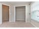 Bedroom closet featuring white shelving and natural light at 11102 Avery Oaks Dr, Tampa, FL 33625