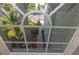 Arched transom window lets light into the entryway and provides a view of the home's exterior at 11102 Avery Oaks Dr, Tampa, FL 33625