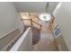 Bright foyer with tile flooring, grand chandelier, and staircase at 11102 Avery Oaks Dr, Tampa, FL 33625