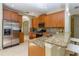 Spacious kitchen featuring granite countertops, stainless steel appliances and ample cabinet space at 11102 Avery Oaks Dr, Tampa, FL 33625