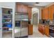 This kitchen features stainless steel appliances, granite countertops, and a walk-in pantry at 11102 Avery Oaks Dr, Tampa, FL 33625