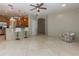 Bright, open-concept living space connects seamlessly to a kitchen with counter seating at 11102 Avery Oaks Dr, Tampa, FL 33625
