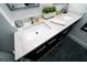 Close-up of bathroom vanity featuring double sinks, marble countertop, and modern fixtures at 1120 E Kennedy Blvd # 1208, Tampa, FL 33602