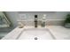 Bathroom vanity featuring marble countertops and contemporary fixtures at 1120 E Kennedy Blvd # 1208, Tampa, FL 33602