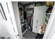 Organized walk-in closet with ample shelving, storage bins, and hanging space for clothes at 1120 E Kennedy Blvd # 1208, Tampa, FL 33602
