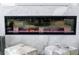 Modern fireplace with marble surround and electric colored flame feature at 1120 E Kennedy Blvd # 1208, Tampa, FL 33602