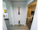 Hallway showcasing contemporary interior design with views into the living room and bathroom at 1120 E Kennedy Blvd # 1208, Tampa, FL 33602