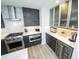 Kitchen area featuring marble counters, stainless steel appliances, sleek cabinetry and counter tops at 1120 E Kennedy Blvd # 1208, Tampa, FL 33602