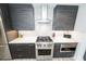 This kitchen is sleek and modern, featuring stainless steel appliances and stylish cabinetry at 1120 E Kennedy Blvd # 1208, Tampa, FL 33602