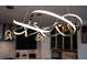 Stunning modern light fixtures illuminating a contemporary kitchen with sleek cabinetry at 1120 E Kennedy Blvd # 1208, Tampa, FL 33602