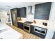 Modern kitchen features stainless steel appliances, sleek cabinetry and counter tops at 1120 E Kennedy Blvd # 1208, Tampa, FL 33602