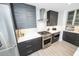 Marble backsplash kitchen area featuring stainless steel appliances, and sleek cabinetry at 1120 E Kennedy Blvd # 1208, Tampa, FL 33602