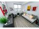 Bright and stylish living room featuring modern art, decor, and comfortable seating area at 1120 E Kennedy Blvd # 1208, Tampa, FL 33602