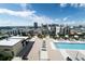 A community pool deck has seating options with city views at 1120 E Kennedy Blvd # 1208, Tampa, FL 33602