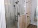 Glass enclosed shower with elegant fixtures and natural stone accents at 1120 E Kennedy Blvd # 1208, Tampa, FL 33602