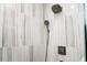 Spa-like shower showcasing marble-look tile, double shower heads, and recessed lighting at 1120 E Kennedy Blvd # 1208, Tampa, FL 33602