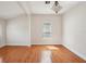 Bright, open living room with hardwood floors and plenty of natural light from the window at 1125 19Th N Ave, St Petersburg, FL 33704