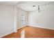 Bright, open living room featuring hardwood floors and natural light from the window at 1125 19Th N Ave, St Petersburg, FL 33704