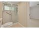 Bathroom shower/bath combo with an added safety handle, and glass sliding door at 1144 Lanyard St, Palm Harbor, FL 34685