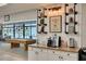 Resident coffee bar and lounge, with comfortable seating and game areas in the background at 1144 Lanyard St, Palm Harbor, FL 34685