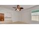 Comfortable dining area with tile floors and a decorative ceiling fan at 1144 Lanyard St, Palm Harbor, FL 34685