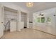 Practical laundry room with washer, dryer, and ample storage space at 1144 Lanyard St, Palm Harbor, FL 34685