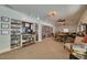 Community library featuring an extensive collection of books and a table for reading or studying at 1144 Lanyard St, Palm Harbor, FL 34685
