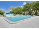 Community swimming pool with plenty of room for swimming laps or for lounging by the pool at 1144 Lanyard St, Palm Harbor, FL 34685