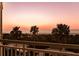 Enjoy spectacular sunset views of ocean and palm trees from this private balcony at 1170 Gulf Blvd # 402, Clearwater, FL 33767