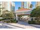 This inviting poolside gazebo offers comfortable seating for relaxation or social gatherings near the community pool at 1170 Gulf Blvd # 402, Clearwater, FL 33767
