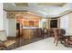 Recreation room features a wet bar, table seating, and large screen television at 1170 Gulf Blvd # 402, Clearwater, FL 33767