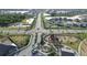 Aerial view of a neighborhood featuring a playground and ponds at 11720 Navajo Sandstone St, Riverview, FL 33579