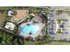 Aerial view of a community clubhouse and pool at 11720 Navajo Sandstone St, Riverview, FL 33579
