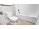 Bathroom with toilet, sink, and bathtub at 11720 Navajo Sandstone St, Riverview, FL 33579