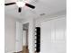Bedroom featuring a ceiling fan, closet and dark colored shelf at 11720 Navajo Sandstone St, Riverview, FL 33579