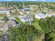 Aerial view of a charming neighborhood with mature trees and well-maintained homes at 11780 Linden Dr, Spring Hill, FL 34608