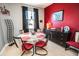 Dining area with a marble-topped table, sleek chairs, and a modern buffet at 1257 Lyndhurst Greens Dr, Sun City Center, FL 33573