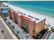 Enjoy the beachfront living at this beautiful multi-story condominium with a red roof at 13720 Gulf Blvd # 305, Madeira Beach, FL 33708