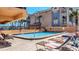 Relax poolside on lounge chairs at this inviting community amenity with nearby condominium building at 13720 Gulf Blvd # 305, Madeira Beach, FL 33708